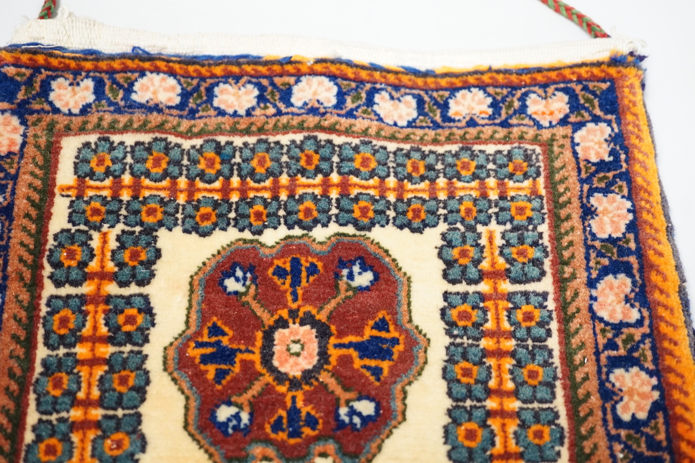 A Qashgai bag with tassel decoration, 31 x 29cm